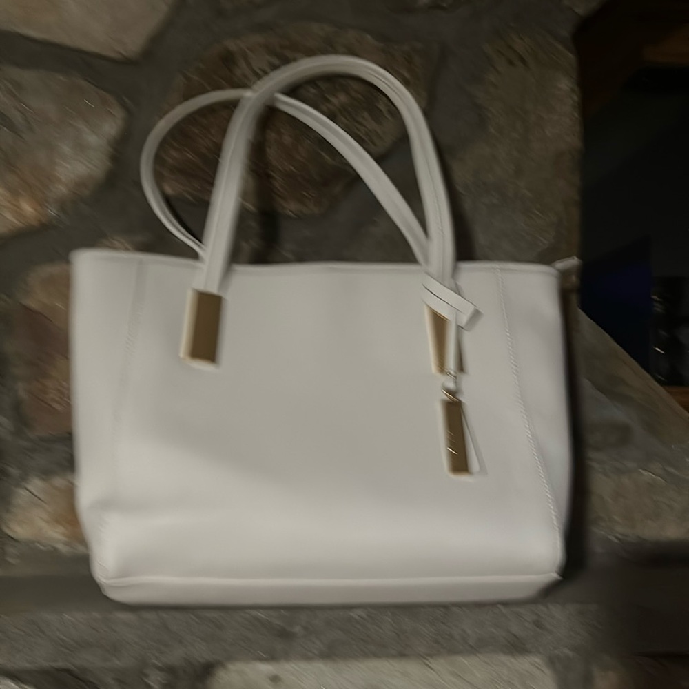 Leather tote handbag.
